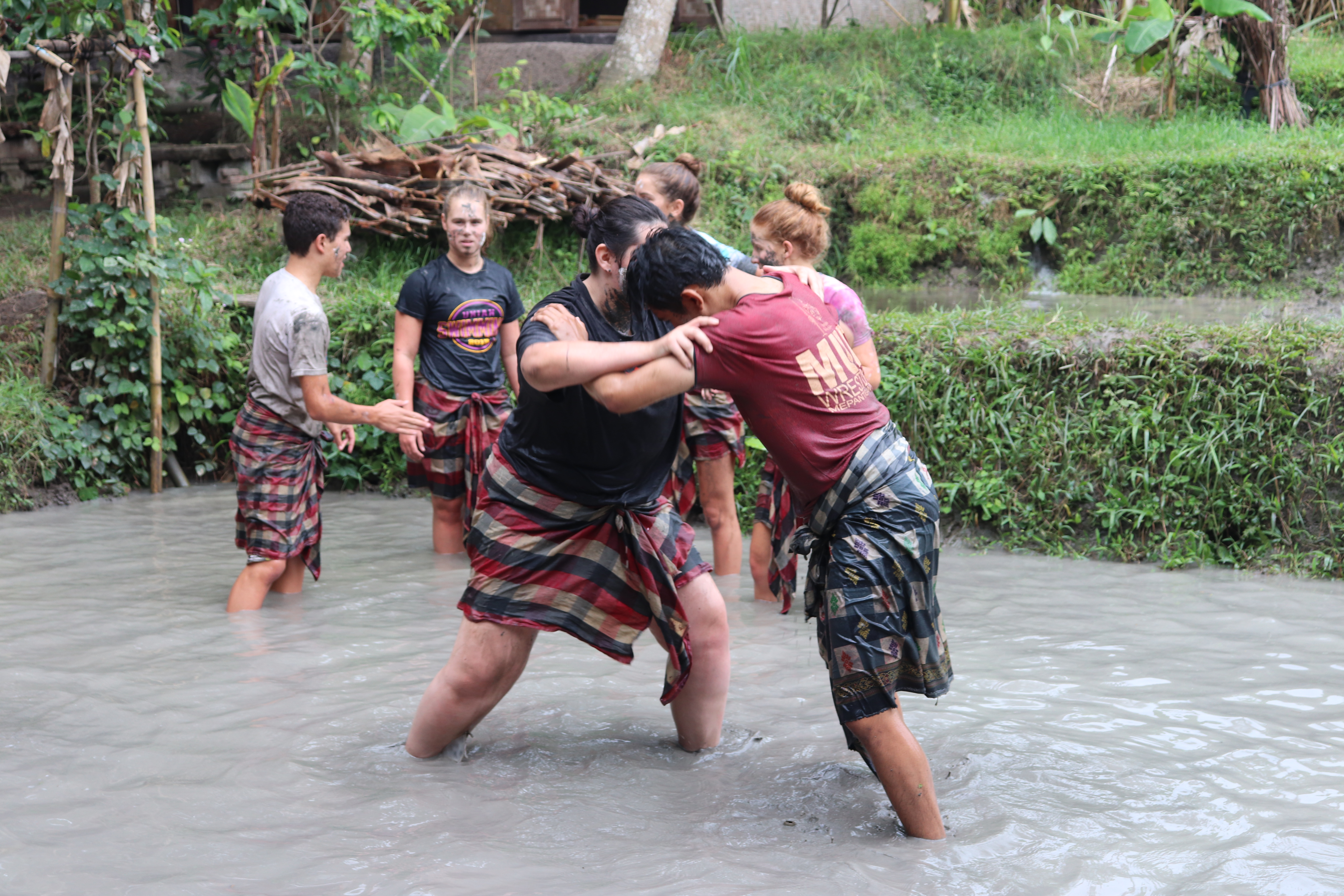 Getting Muddy in Mepantigan Mud Fun Bali Activity | Gus Bali Tour